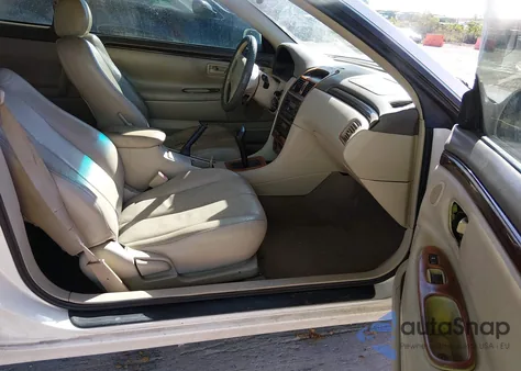 1999 Toyota Camry Solara Sle z USA, uszkodzony, nr VIN 2T1CF22P1XC150796